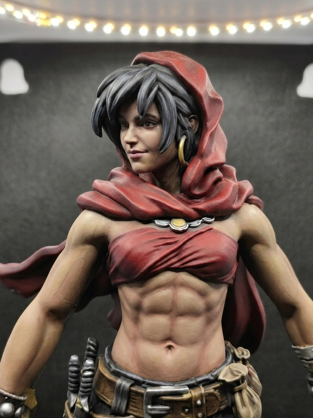 Thief of Mystara fantasy rogue figurine, red hood, stone base