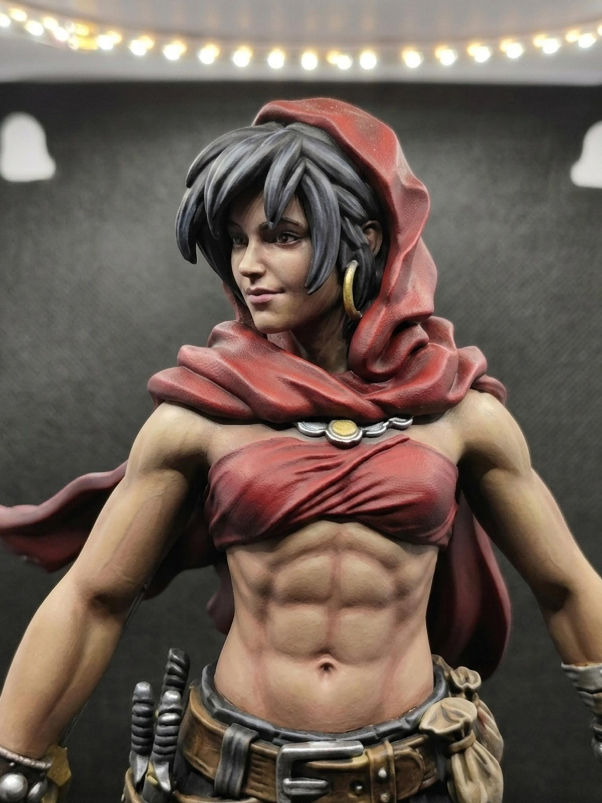Thief of Mystara fantasy rogue figurine, red hood, stone base
